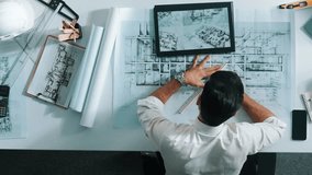 Top down view of relaxed architect engineer working on blueprint and putting leg on meeting table. Aerial view of skilled interior designer lie on the chair while sleeping in break time. Alimentation. - Powered by Shutterstock - Get 15% off with code: PIKWIZARD15