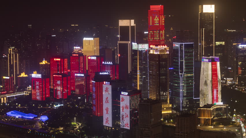 CHONGQING, CHINA - 28 MAY 2025 : Timelapse of the amazing Chongqing city skyline from a high vantage point at night