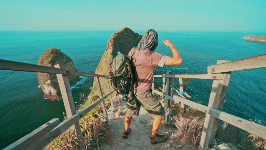 famous beach in Bali, Bali tropical lagoon, aerial view of paradise Nusa Penida island in Indonesia, amazing bay in Indonesia, idyllic Bali travel . High quality 4k footage