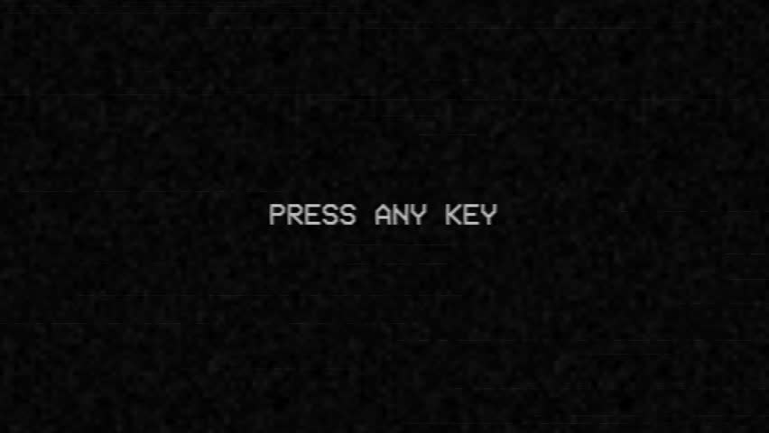 Press any key text in the black retro screen with noise and interference