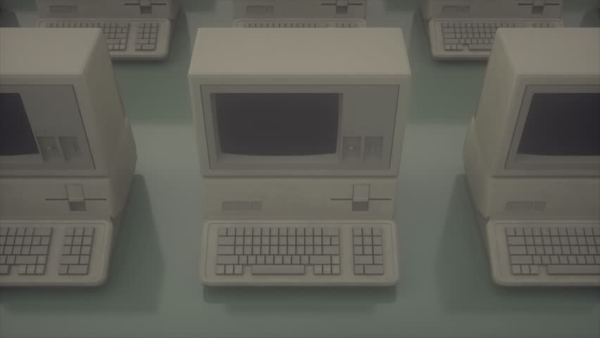 Old Computer Terminals Showing Programming Code on CRT Monitors