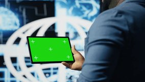 African american engineer shows tablet with isolated mockup display, examining predictive analytics and neural networks for data processing automation and innovation. Cybernetics. Camera B. - Powered by Shutterstock - Get 15% off with code: PIKWIZARD15