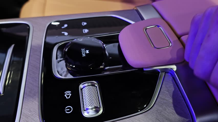 Modern premium car, gear shifting. close up. 