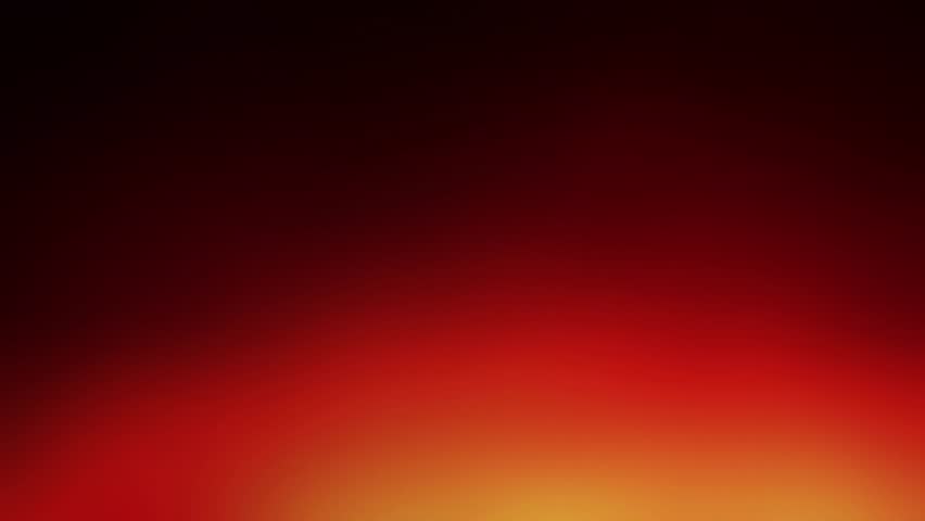 Halloween Night Flicker Light Leak 4K Loop features red, black, and orange lights flickering to create a Halooween themed light leak in a loop.