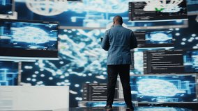 African american skilled engineer programming for innovation hub, reviewing big data and binary code on the dashboard. IT developer working on programming language algorithm. Camera A. - Powered by Shutterstock - Get 15% off with code: PIKWIZARD15