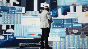 Young startup administrator reviews big data with virtual reality headset, working hard on business growth to increase profit. Analyzing monthly reports for productivity and success. Camera A. - Powered by Shutterstock - Get 15% off with code: PIKWIZARD15