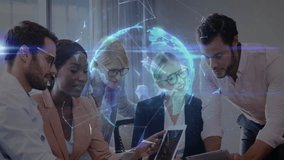 Business team pointing at laptop and tablet revealing network overlay forming rotating globe. Collaboration, innovation, connectivity, teamwork, analytics, technology, digital - Powered by Shutterstock - Get 15% off with code: PIKWIZARD15