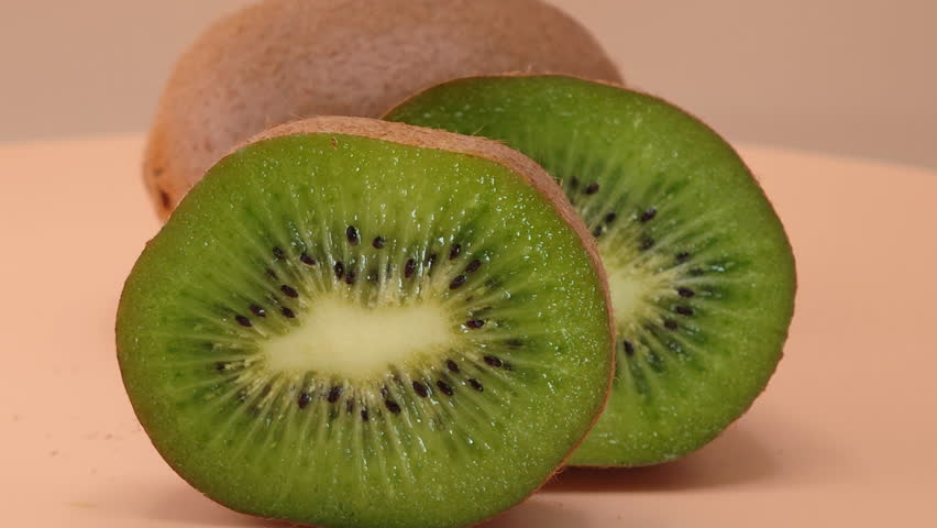 Green Kiwi  fruit on empty space