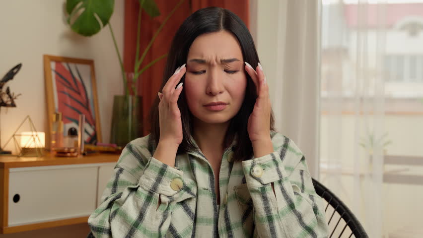 Asian Korean Chinese Japanese woman massage temples head headache suffer female health problem medicine girl feeling pain ache unwell bad dizzy businesswoman migraine symptom indoors pressure debt ill