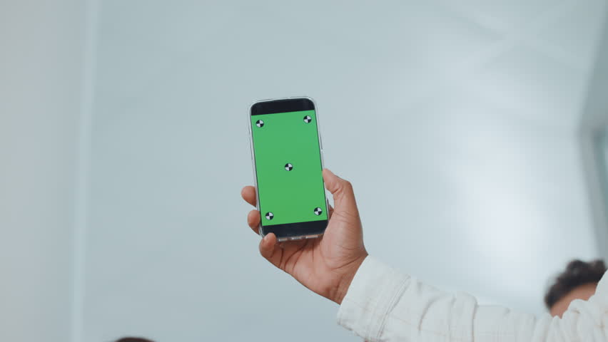 Business people, hands and thumbs up with phone screen or mockup for good app or approval. Group, employees or mobile smartphone display with team, like emoji or yes sign for UI, UX or media platform