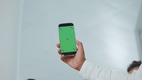 Business people, hands and thumbs up with phone screen or mockup for good app or approval. Group, employees or mobile smartphone display with team, like emoji or yes sign for UI, UX or media platform - Powered by Shutterstock - Get 15% off with code: PIKWIZARD15