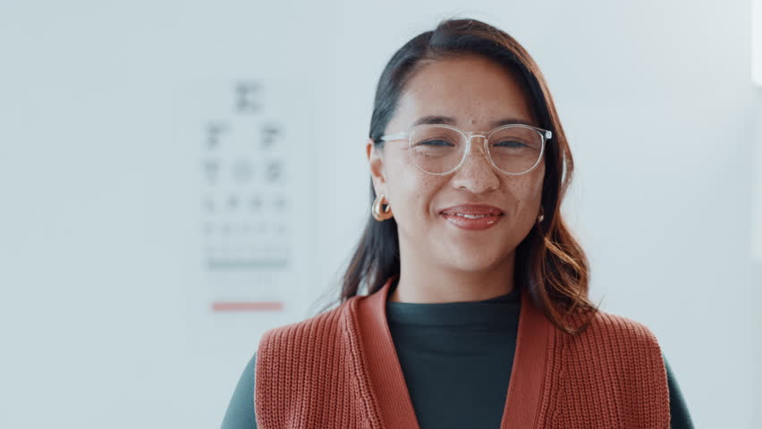 Eye exam, face and glasses with customer at optometry clinic for prescription frame lens fitting. Ophthalmology, test and vision with smile of woman in eyewear store to correct or improve eyesight