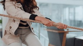 Hands, pulling and rope with business people in office for collaboration, effort or strength. Competition, power and team building with employee group in workplace for tug of war challenge or game - Powered by Shutterstock - Get 15% off with code: PIKWIZARD15