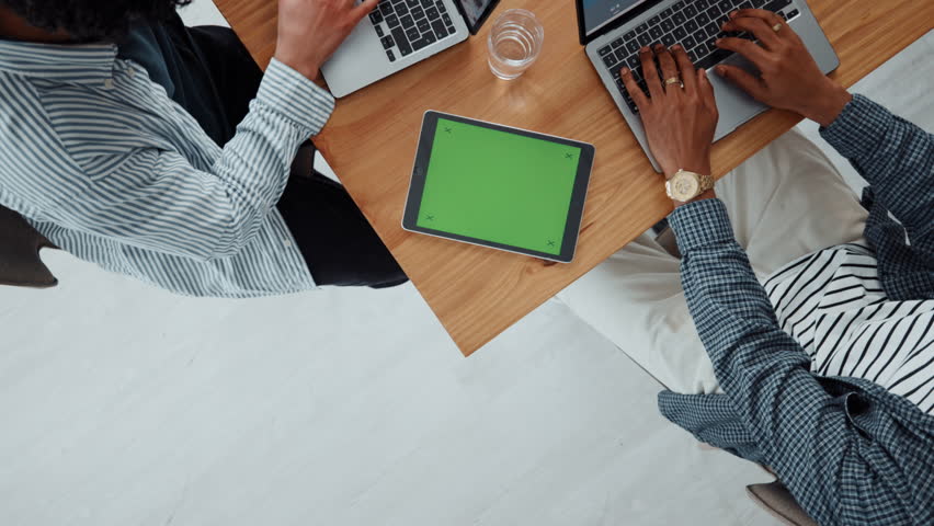 Above, green screen and business people in office, tablet and copywriting with website layout. Closeup, employees and journalist in meeting, tech or deadline with collaboration or magazine editor