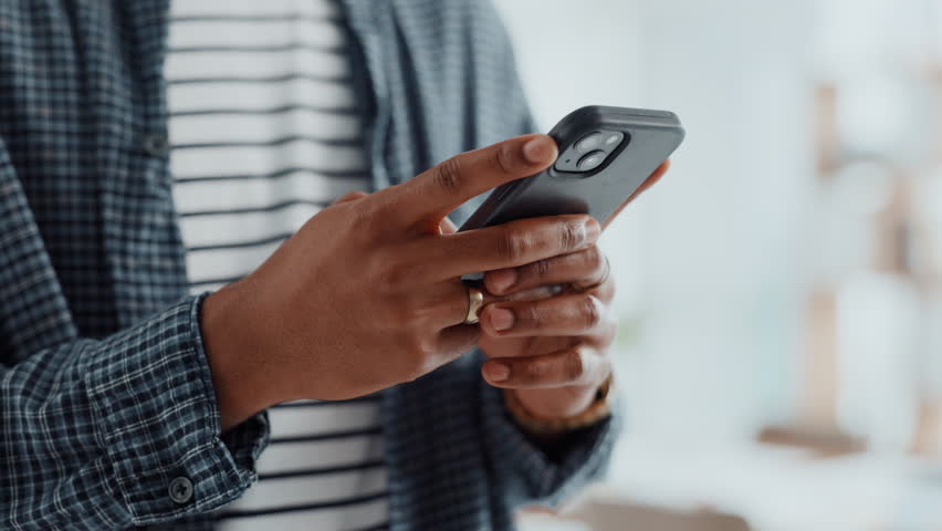 Hands, man and typing with phone in office for research, news editor and feedback of source contact. Journalist, mobile or review for fact check, communication and proofreading article of publication