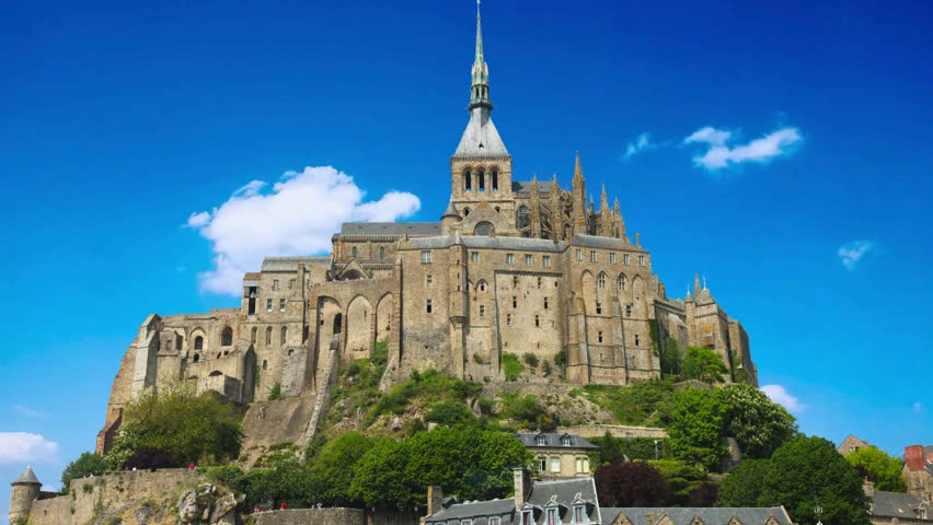 Mont saint Michel, a tidal island and mainland commune in Normandy, Franceclose up of Mont Saint Michel on sunset,  FranceAerial view, France, Normandy, Salt marshes,  Mont-Saint-Michel monastery and 