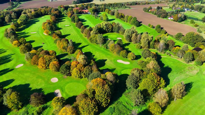 Aerial drone view of autumn golf course in Germany. High quality 4k footage
