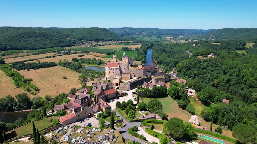 The Chateau de Beynac and the village of Cazenac along the Dordogne River, France