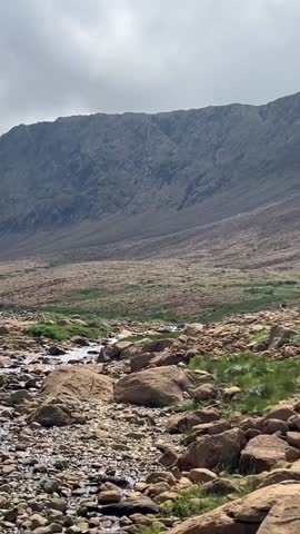 Gros Morne National Park, located in western Newfoundland, Canada, is a UNESCO World Heritage Site known for its dramatic natural beauty. The park features towering cliffs, deep fjords.