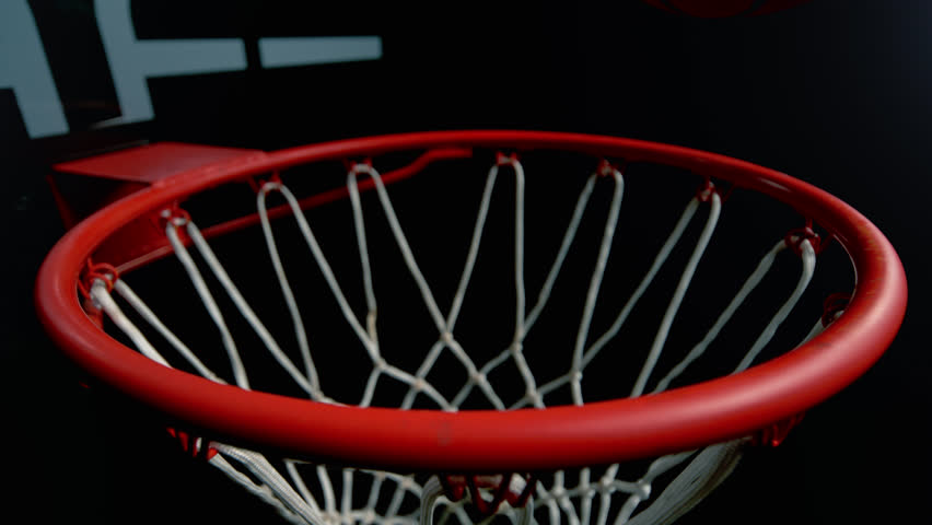 Super Slow Motion of Basketball Ball Going Through Hoop Net at 1000fps.