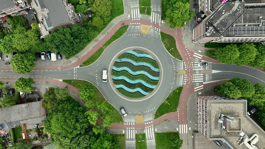 Aerial top shot from  traffic on a roundabout in the Netherlands