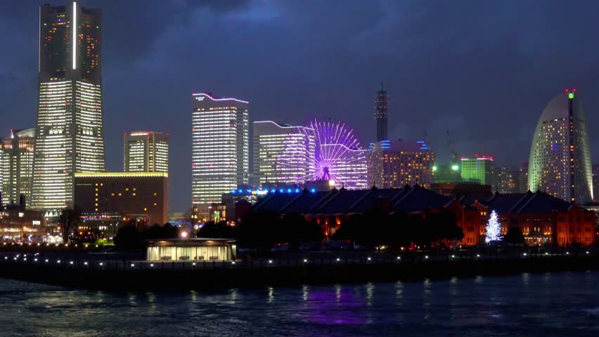 The yokohama skyline glows at night