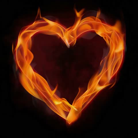 Heart shape made of fire, slowly burning hot metal, isolated on black. 4k high-definition flames. Valentine's Day concept