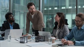 Multiracial business group multiethnic women men businesspeople office meeting briefing Caucasian leader talking discussing planning African American Indian employes team coworkers negotiation startup - Powered by Shutterstock - Get 15% off with code: PIKWIZARD15