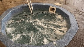 Bubbling hotel hot tub spa, indoor pool - Powered by Shutterstock - Get 15% off with code: PIKWIZARD15