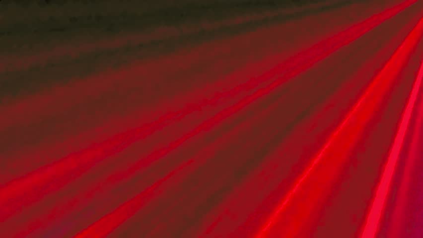 Abstract explosion of colorful light streaks in motion.