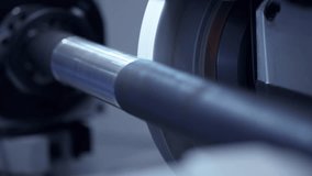 Grinding and straightening of shafts for trucks on CNC machine. - Powered by Shutterstock - Get 15% off with code: PIKWIZARD15