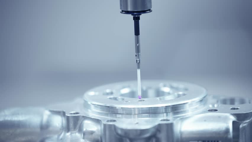 Precision measurement with cnc coordinate measuring machine inspecting metal component.