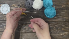 Bag crocheted from multi-colored threads. Yellow with gray, black and other colors in jacquard knitted fabric. Handmade - Powered by Shutterstock - Get 15% off with code: PIKWIZARD15