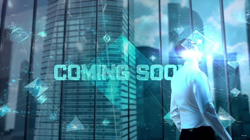 COMING SOON. Businessman Working in Office among Skyscrapers. Hologram Concept