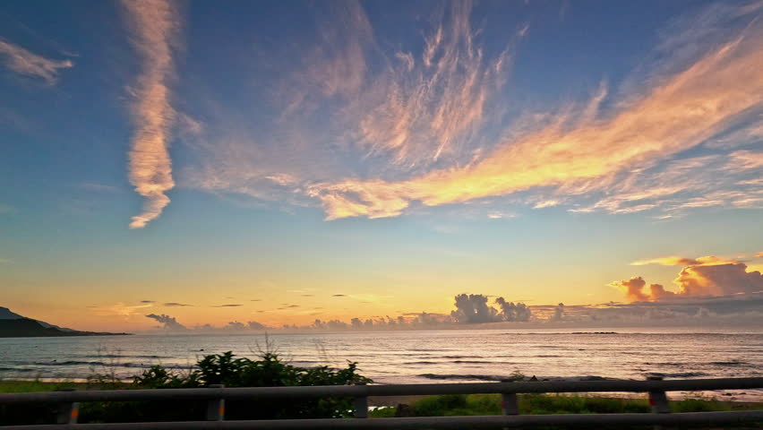 Driving into sunrise on  coast highway 