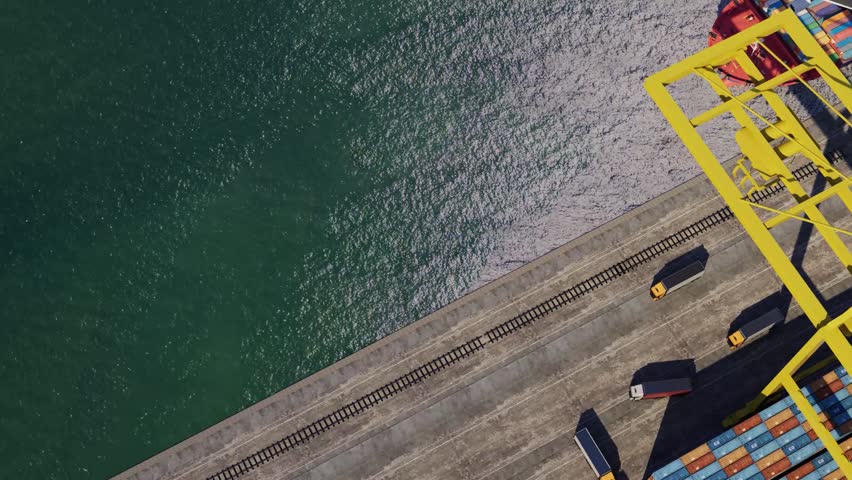 3D illustration of global logistics hub featuring cargo ship, freight train, airplane, and trucks at a seaport terminal with containers and cranes under clear blue sky.


