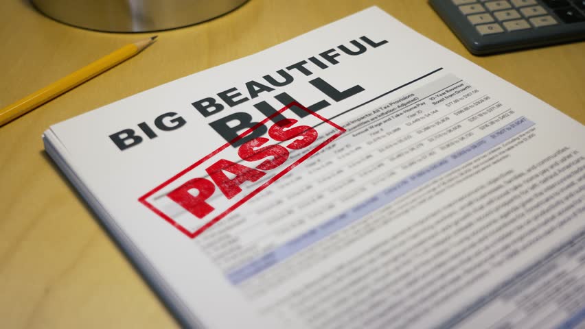 Close-up of a political document titled “BIG BEAUTIFUL BILL” stamped with a bold red “PASS.” Scene includes a pencil, calculator, and desk—symbolizing legislation approval or policy reform. 14705	