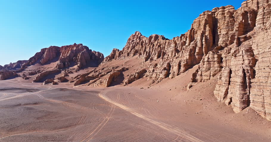 Aerial view of the yardang landform mountain in desert. Famous Dahaidao no man's land natural landscape in Xinjiang, China.