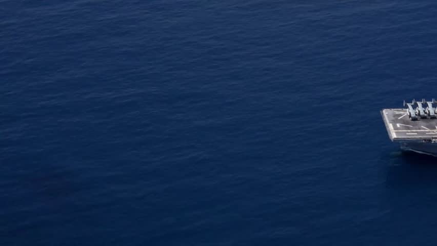 The Wasp-class amphibious assault ship USS Iwo Jima participate in a strait transit exercise.