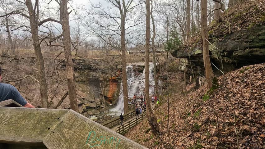 	
Exploring Brandywine Falls in Cuyahoga National Park during springtime with visitors admiring nature