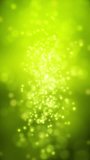 Vertical video animation of green light shine particles bokeh over green background - seamless loop - vacation concept. - Powered by Shutterstock - Get 15% off with code: PIKWIZARD15