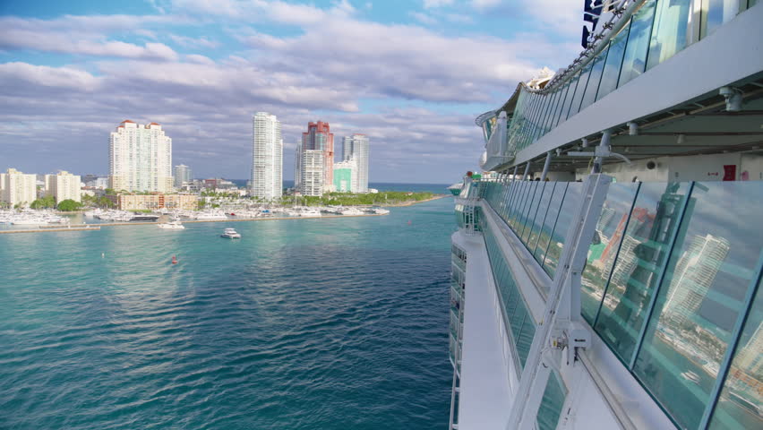 Port of Miami, Florida, USA - JANUARY 21, 2025: A stunningly beautiful view of the vibrant Port of Miami, showcasing the clarity of its waters alongside striking skyscrapers reaching the sky