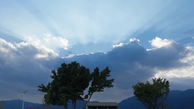 Sunlight Beams Through Clouds – Crepuscular Rays over Yunnan - Powered by Shutterstock - Get 15% off with code: PIKWIZARD15