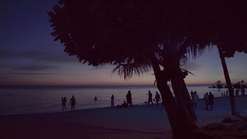 Willy Rock is a tidal island with a statue of the Virgin Mary at the Boracay beach in Philippines