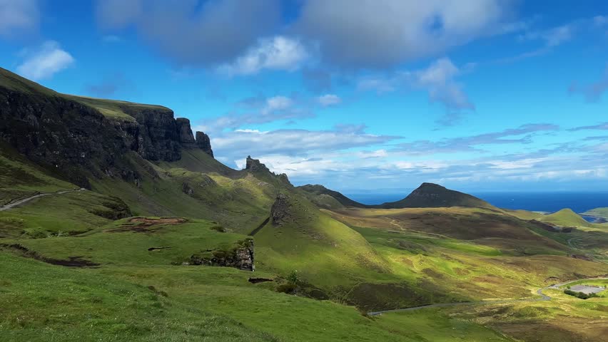 Green Lush Mountain Valley In Quiraing On Isle Of Skye In Scotland - Panning Shot