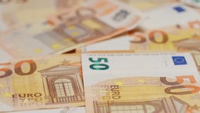 Bitcoin coin and euro notes in close-up with a focus on currency exchange - Powered by Shutterstock - Get 15% off with code: PIKWIZARD15