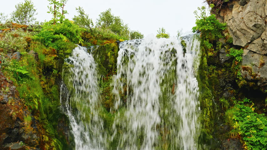 The Gjáin valley in Iceland is like a small oasis with waterfalls and lots of greenery.