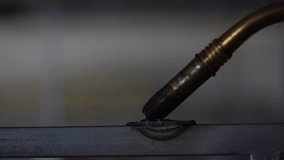 Electric welding torch emits blue arc and sparks on metal surface with smoke
 - Powered by Shutterstock - Get 15% off with code: PIKWIZARD15