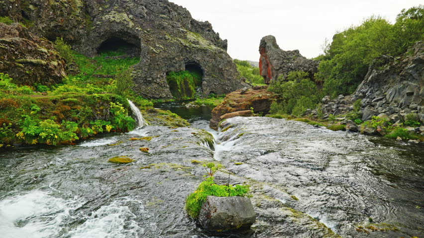 The Gjáin valley in Iceland is like a small oasis with waterfalls and lots of greenery.