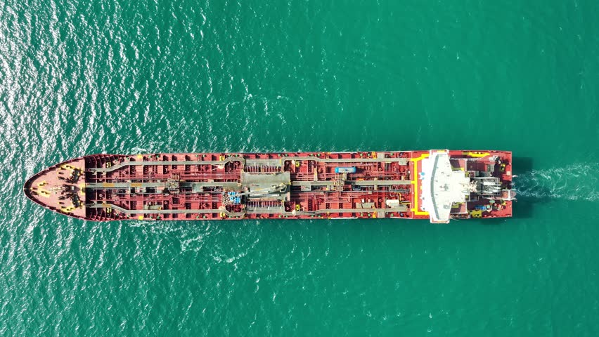 Aerial view of big oil, chemical tanker sails. Tanker ship logistic and transportation business oil and gas industry.